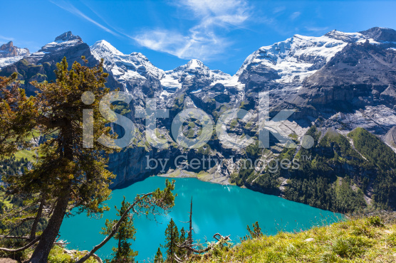 http-::www.istockphoto.com:photo:panorama-view-of-oeschinensee-oeschinen-lake-on-bernese-oberla-gm506222414-84110889?st=a931be1